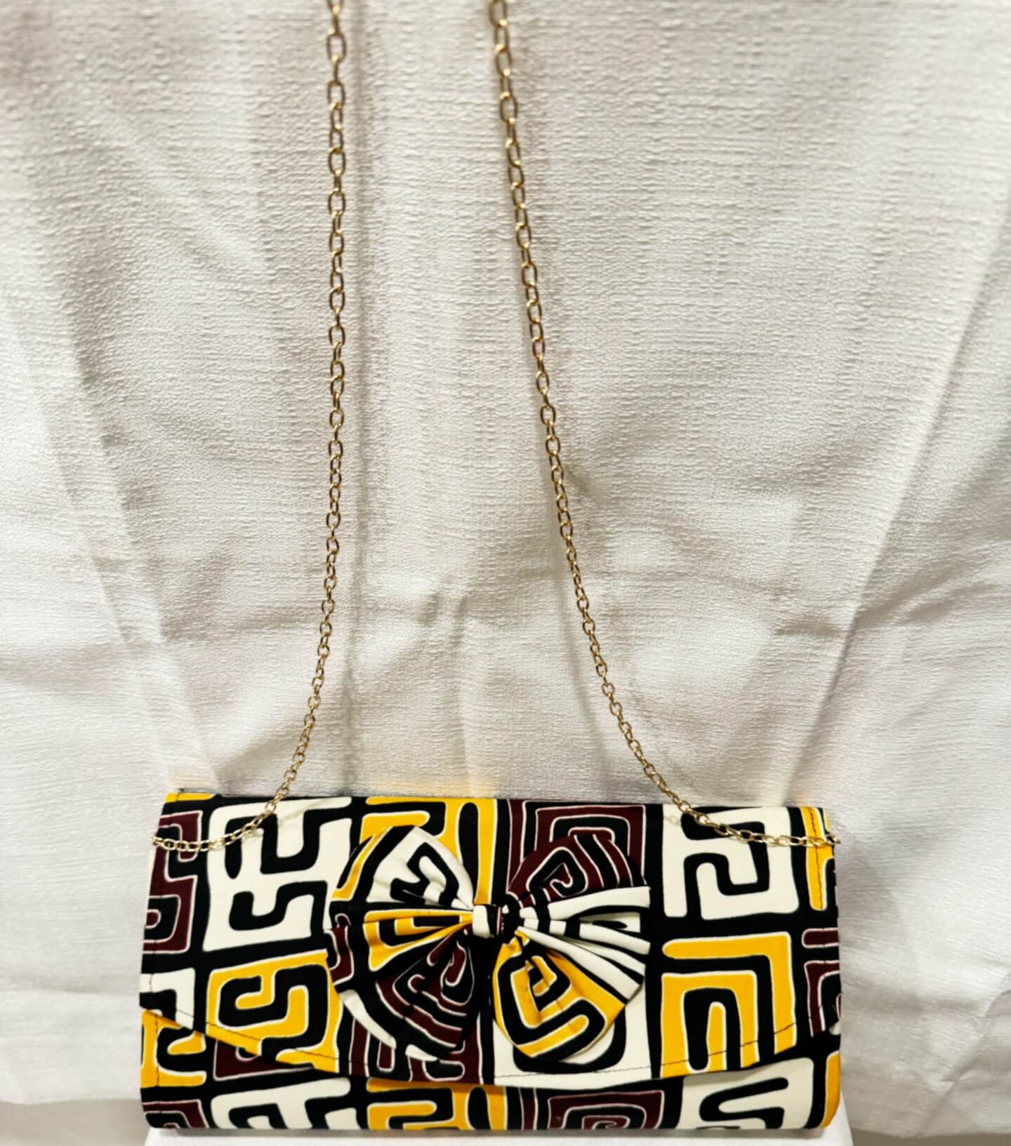 Rosemary Brown/gold/white